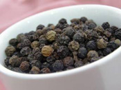 a bowl of the finest black peppercorns